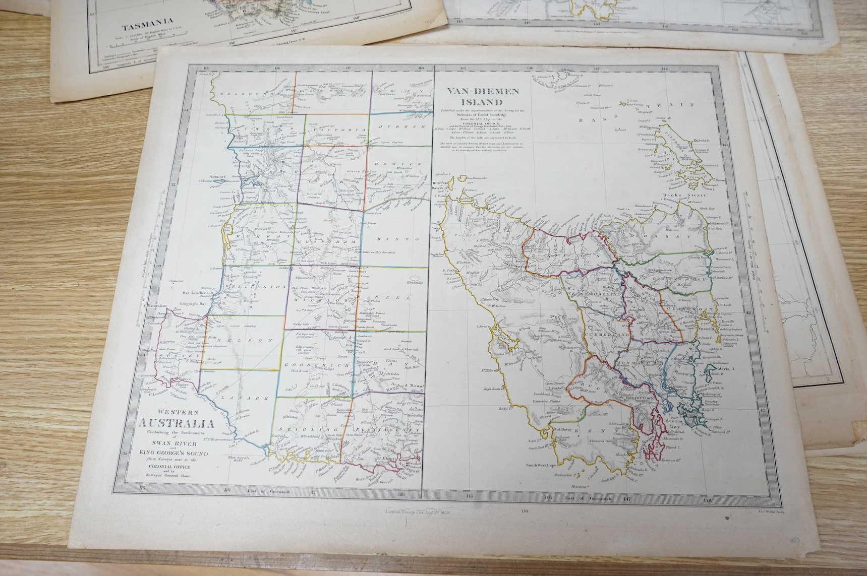 A collection of 19th century engraved maps to include Western Australia, Tasmania and New South Wales, unframed, largest 42 x 35cm. Condition - some foxing and discolouration
